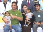 The twins with their parents and relatives. (X/@ANI)