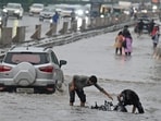 Visuals showed vehicles and people wading through multiple flooded roads.