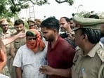 Police take three jailed accused in Ram Temple donations embezzlement case Anukalp Mishra, Lavkush Mishra and Karunesh Pandey from 14 Kosi Parikrama Marg for further proceedings, in Ayodhya on Wednesday.