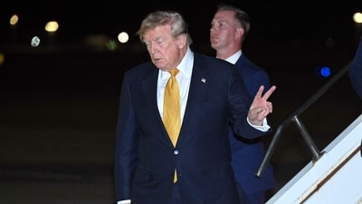 Eric Trump and his family were aboard the first aircraft to land at the newly renamed airport in the pre-dawn hours on a private plane. (AFP) Eric Trump and his family were aboard the first aircraft to land at the newly renamed airport in the pre-dawn hours on a private plane. (AFP)