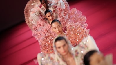 The designer showcased his Women's Haute Couture Fall/Winter 2026-2027 collection during Paris Fashion Week, in Paris, on July 8. (AFP) The designer showcased his Women's Haute Couture Fall/Winter 2026-2027 collection during Paris Fashion Week, in Paris, on July 8. (AFP)