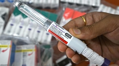 A distributor displays Mounjaro (tirzepatide) self-injecting GLP-1 prefilled pens at his office in Thane, Mumbai. (AFP) A distributor displays Mounjaro (tirzepatide) self-injecting GLP-1 prefilled pens at his office in Thane, Mumbai. (AFP)