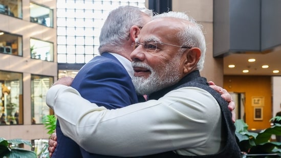 In this image received on July 9, 2026, Prime Minister Narendra Modi embraces Australian Prime Minister Anthony Albanese during the India-Australia CEOs Forum, in Melbourne, Australia. (PMO)