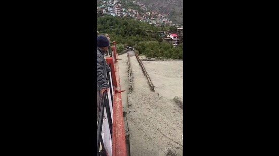 The submerged bridge in Kinnaur on Thursday. (HT Photo)