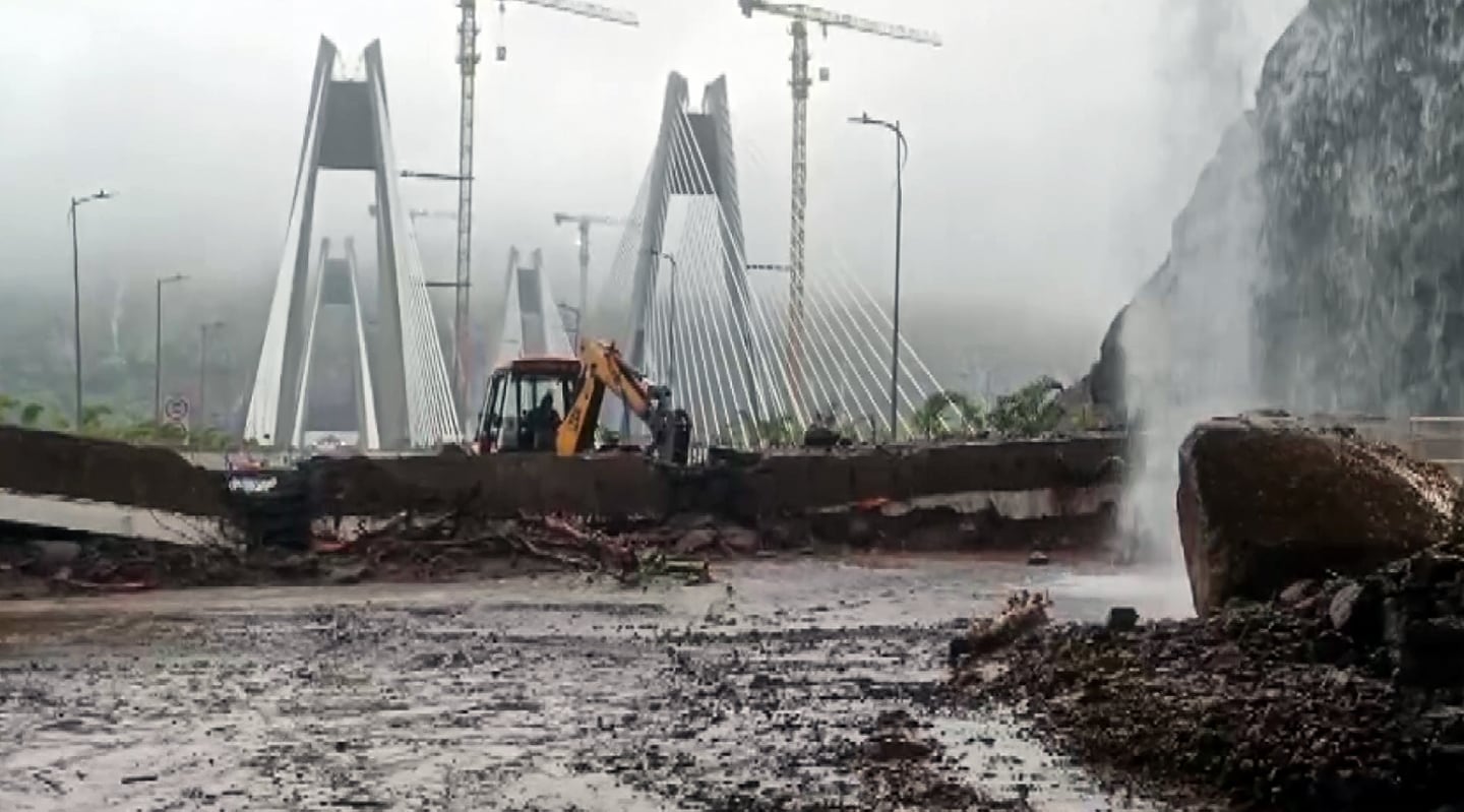 Restoration work underway following a landslide on the Missing Link section of the Mumbai–Pune Expressway near the Khandala Exit after heavy rainfall, in Pune. (ANI Video Grab) Restoration work underway following a landslide on the Missing Link section of the Mumbai–Pune Expressway near the Khandala Exit after heavy rainfall, in Pune. (ANI Video Grab)