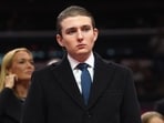 A TikTok influencer shares claims about Barron Trump's dynamic with his parents, alleging he often sought Donald Trump's attention while playing outside.