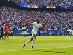 Kylian Mbappe celebrates scoring the opening goal during the World Cup quarterfinal.