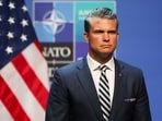 Amidst the US-Iran conflict, Defense Secretary Pete Hegseth's visit to a Navy ship revealed concerns over his beard policy enforcement. 