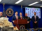First Assistant United States Attorney for the Central District of California Bill Essayli speaks as US and Canadian law enforcement officials announce federal charges and arrests of alleged members of a transnational organized crime group, at FBI offices in Los Angeles, California, US July 7, 2026.  