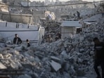 The rubble of ruined buildings in a camp near Gaza City.