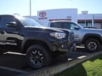 DALY CITY, CALIFORNIA - FEBRUARY 28: Toyota Tacoma trucks are displayed on the sales lot at City Toyota on February 28, 2024 in Daly City, California. Toyota announced plans to recall nearly 381,000 Toyota Tacoma pickup trucks due to an issue with parts falling off the rear axle that could result in a crash. (Photo by Justin Sullivan/Getty Images)