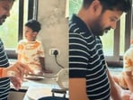 Revanth Reddy shares a sweet moment with his grandson in the kitchen.