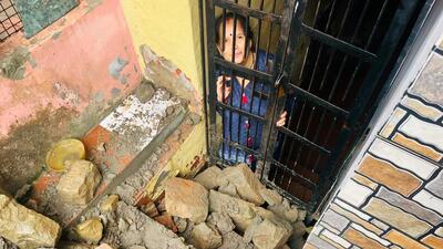 A woman trapped in her house after a retaining wall collapsed near Bada Chowk in Nahan in Sirmaur district amid incessant rain on Friday. The collapse sent debris crashing down, blocking the passage and jamming doors and windows of houses. (HT Photo) A woman trapped in her house after a retaining wall collapsed near Bada Chowk in Nahan in Sirmaur district amid incessant rain on Friday. The collapse sent debris crashing down, blocking the passage and jamming doors and windows of houses. (HT Photo)