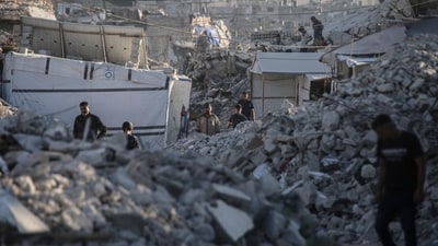 The rubble of ruined buildings in a camp near Gaza City. The rubble of ruined buildings in a camp near Gaza City.