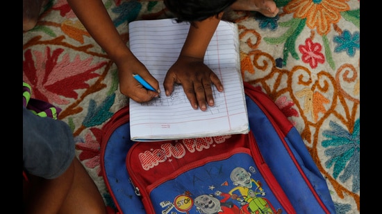 As part of the programme, Anganwadi workers will encourage parents of children below three years to spend 10-15 minutes every day talking, singing, reading stories and playing with their children. (AP File)
