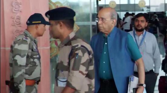 Nripendra Misra, chairman of the Ram Mandir Construction Committee, arrives at the airport in Ayodhya. (ANI video grab)