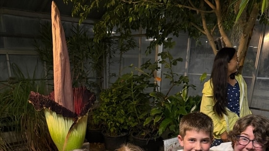 Jill Parrett and family visit the corpse flower at the University of Rhode Island.