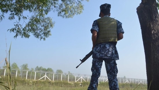 A Myanmar border policeman stands near the Taungpyo Bangladesh-Myanmar border gate on the outskirts of Maungdaw in Rakhine state. (AFP)