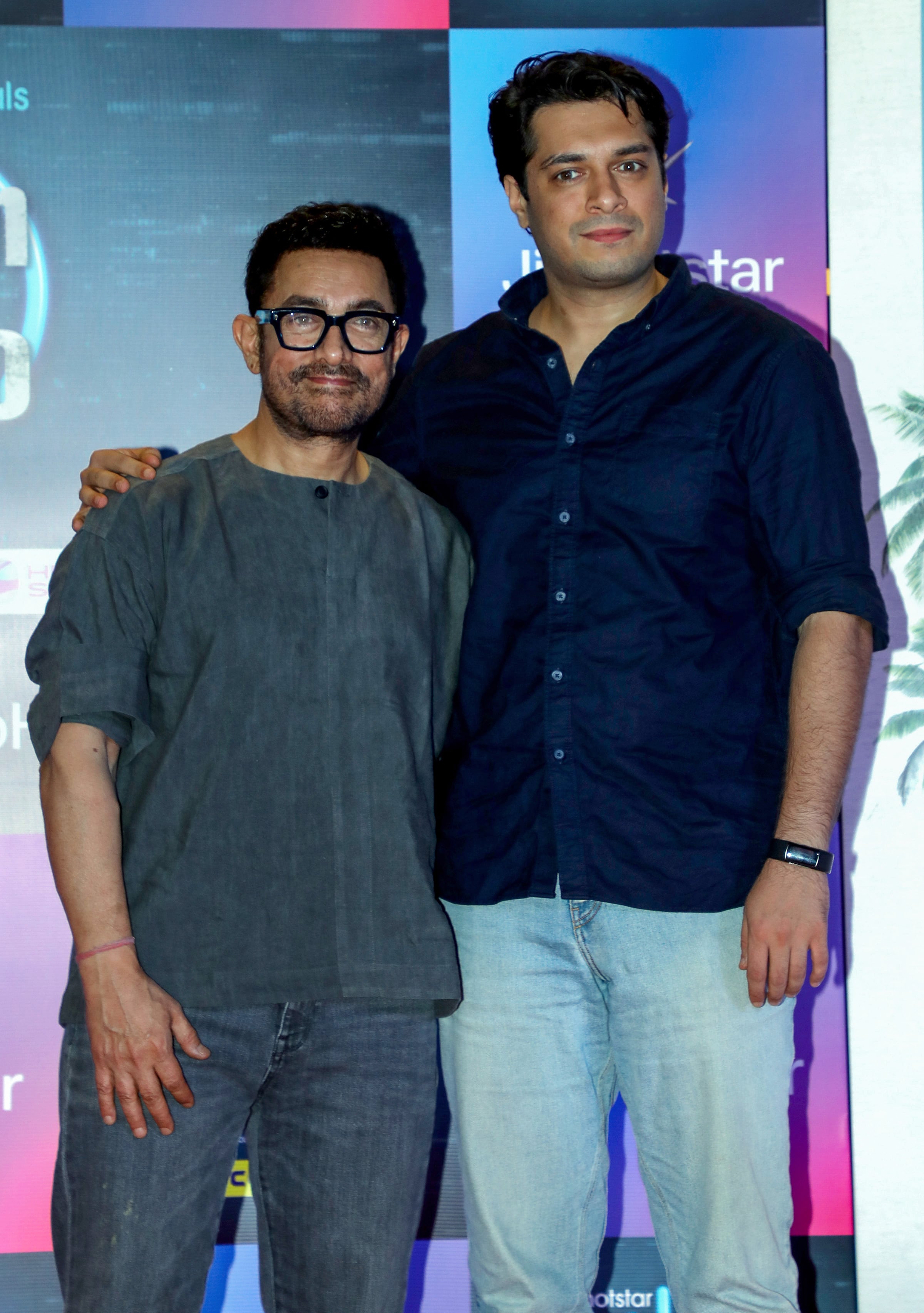 Actors Aamir Khan and Junaid Khan pose for a photo at the screening of the web series 'Pritam & Pedro’. ( sunil khandare)