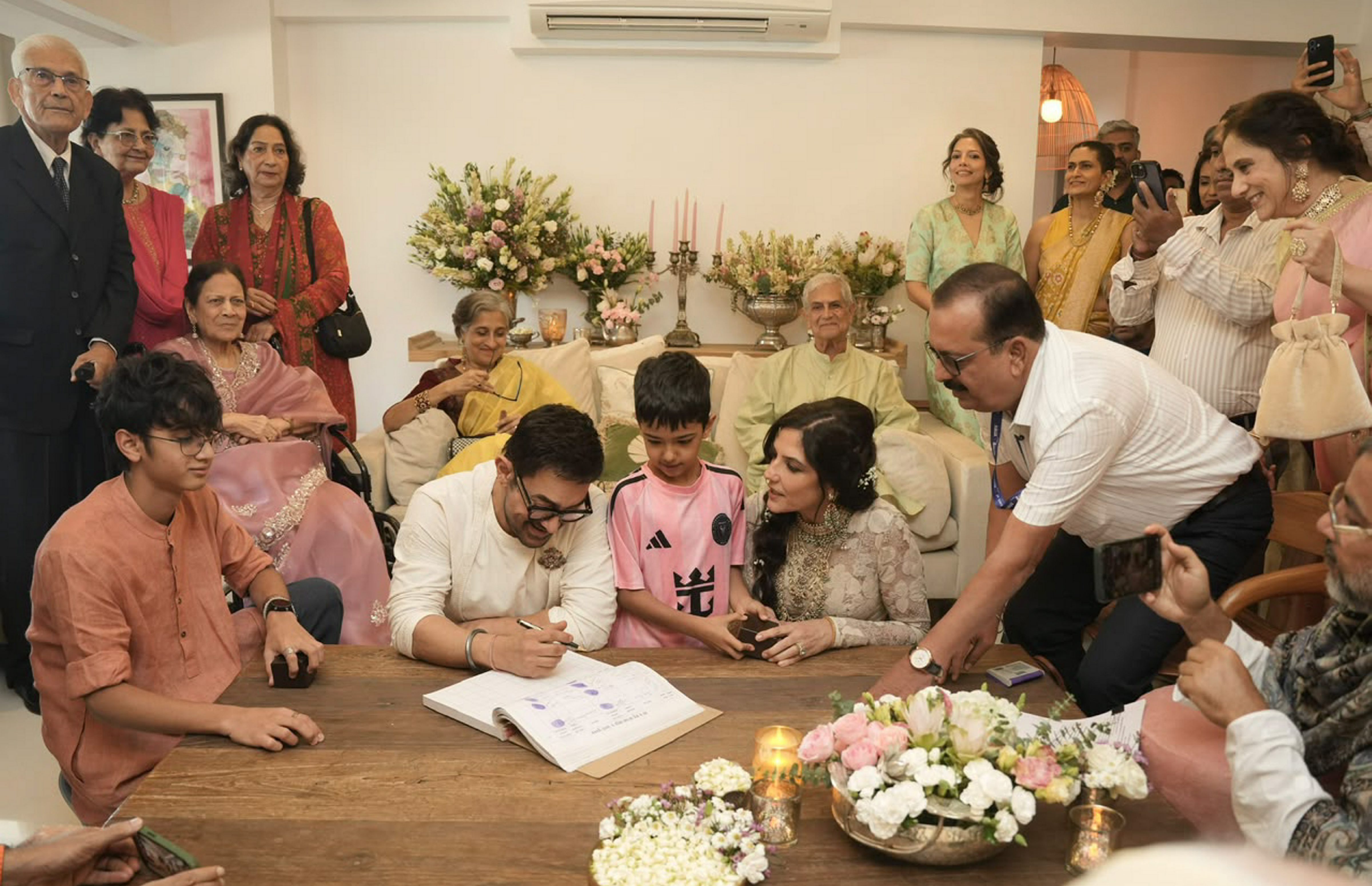 Bollywood actor Aamir Khan and wellness sector professional Gauri Spratt during their wedding ceremony. (Handout )