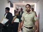 Accused Prahalad Kulkarni being brought to Rouse Avenue Court in connection with the NEET-UG 2026 paper leak case, 