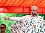 Jammu and Kashmir CM Omar Abdullah addresses a convention, demanding restoration of statehood, on the death anniversary of his grandmother, at Hazratbal in Srinagar on Saturday.