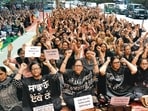 Anganwadi workers protesting outside the mini-secretariat in Ludhiana on Friday. (HT PHOTO)
