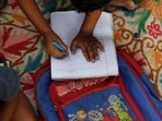 As part of the programme, Anganwadi workers will encourage parents of children below three years to spend 10-15 minutes every day talking, singing, reading stories and playing with their children. (AP File)