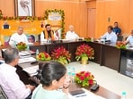 Bihar Chief Minister Samrat Choudhary, along with Deputy Chief Ministers Vijay Kumar Choudhary and Vijendra Prasad Yadav, transfers a sum of  <span class='webrupee'>₹</span>1,423.94 crore through Direct Benefit Transfer (DBT) into the accounts of 97.84 lakh social security pension beneficiaries in Patna on Friday. (Santosh Kumar/HT)