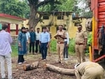 Deputy director of the Dudhwa buffer zone Kirti Chaudhary conducts an inquiry into the recovered khair wood at the Maheshpur range office on Friday. (Sourced)