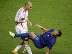A photo taken on July 9, 2006 shows French midfielder Zinedine Zidane (left) gesturing after head-butting Italian defender Marco Materazzi during the World Cup 2006 final.