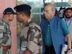 Nripendra Misra, chairman of the Ram Mandir Construction Committee, arrives at the airport in Ayodhya. (ANI video grab)