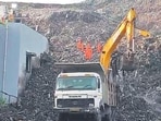 Pune, Jul 10 (ANI): Earth movers deployed at the building collapse incident site in the Moshi area of Pimpri Chinchwad, in Pune on Friday. (ANI Video Grab) (ANI Video Grab)