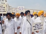 SGPC members and employees taking out a protest march in Amritsar on Friday. (Sameer Sehgal/HT)