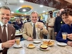 Christopher Nolan, Matt Damon and Tom Holland at Olympia Coffee House, Colaba, Mumbai.