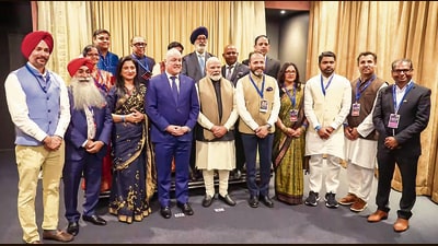 Prime Minister Narendra Modi with New Zealand Prime Minister Christopher Luxon and others during a community event in Auckland, New Zealand. (@NarendraModi) Prime Minister Narendra Modi with New Zealand Prime Minister Christopher Luxon and others during a community event in Auckland, New Zealand. (@NarendraModi)