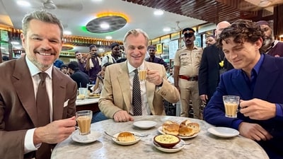 Christopher Nolan, Matt Damon and Tom Holland at Olympia Coffee House, Colaba, Mumbai. Christopher Nolan, Matt Damon and Tom Holland at Olympia Coffee House, Colaba, Mumbai.