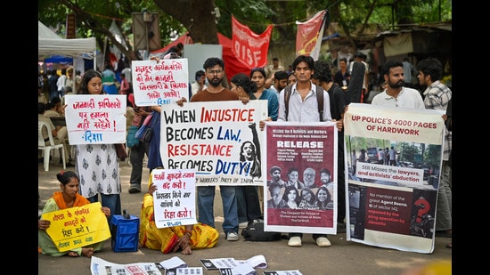 Protest at Jantar Mantar organised by a human rights advocacy group – Campaign for the Release of Workers and Activists of Noida (CaRWAN) – on Saturday. (Sanchit Khanna/ HT Photo)
