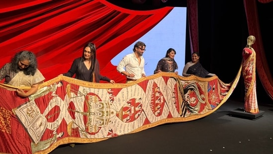 A four-kilometre-long saree was embroidered with thousands of signatures supporting the removal of the marital rape exception. (X/ @TheSafecityApp)