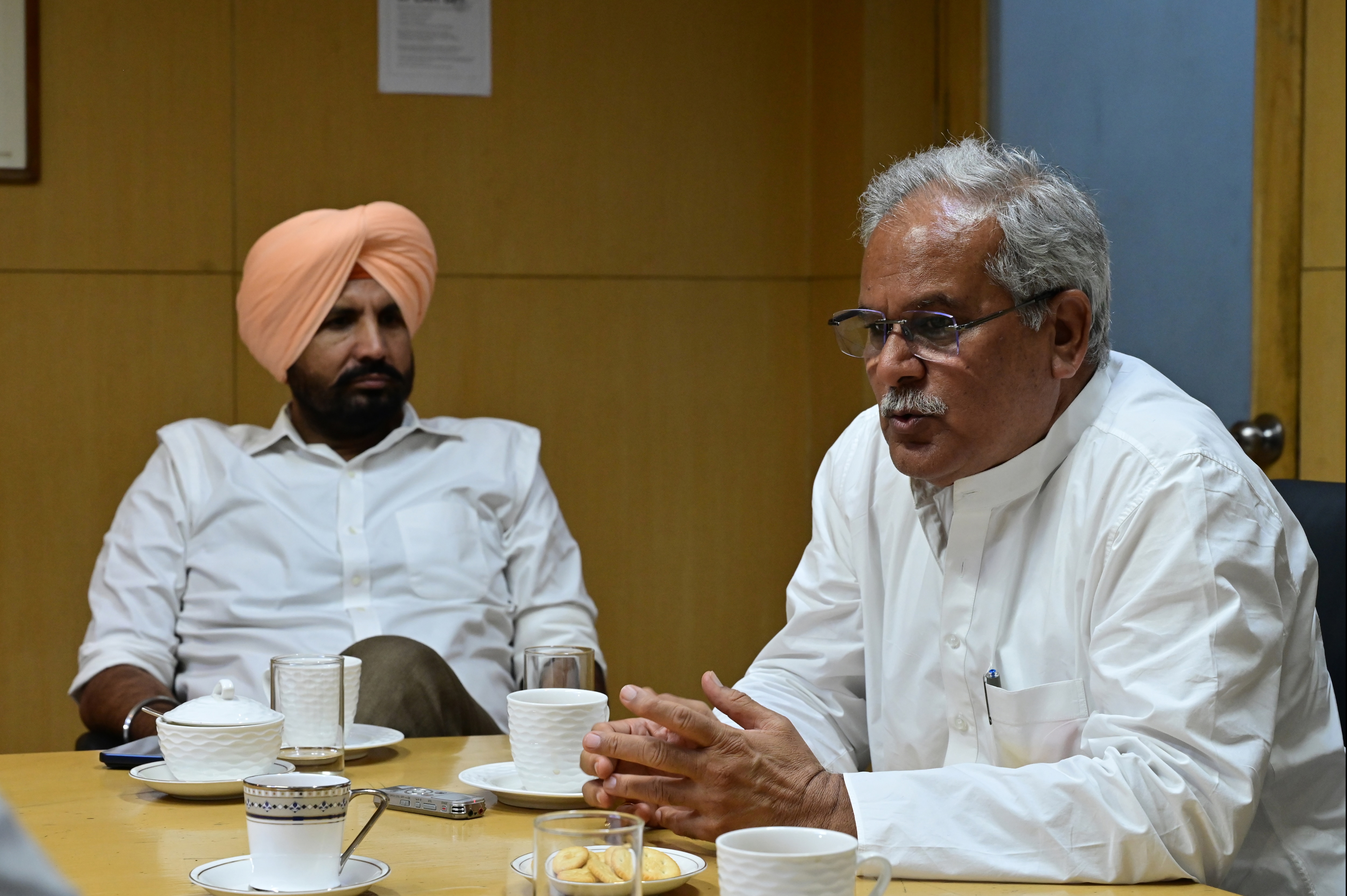 Bhupesh Baghel at the HT Mohali office earlier this week for an interview. Seen along with him is Punjab Congress president Amarinder Singh Raja Warring. (Ravi Kumar/HT) Bhupesh Baghel at the HT Mohali office earlier this week for an interview. Seen along with him is Punjab Congress president Amarinder Singh Raja Warring. (Ravi Kumar/HT)