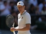 Jannik Sinner of Italy celebrates a point against Alexander Zverev of Germany in the men's singles final at Wimbledon Tennis Championships in London, Sunday, July 12, 2026. (AP Photo/Kirsty Wigglesworth)