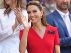 Britain's Princess Kate waves from the royal box on day 13 of the Wimbledon Tennis Championships in London, Saturday, July 11, 2026. (AP Photo/Kirsty Wigglesworth)