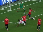 England's Jude Bellingham (10) scores his side's first goal against Norway