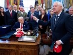 File photo of late US Senator Lindsey Graham (R), Republican of South Carolina, speaking to the press alongside US President Donald Trump, surrounded by members of Congress.