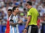 Lionel Messi #10 of Argentina speaks with referee Joao Pinheiro during the FIFA World Cup 2026 Quarter Final match between Argentina and Switzerland