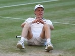 Jannik Sinner celebrates after beating Alexander Zverev to win the Wimbledon men's singles final on Sunday. (AP)