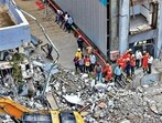 NDRF personnel at the site after a three-storey administrative building of a Waste-to-Energy (WTE) plant run by the Pimpri Chinchwad Municipal Corporation collapsed when an adjacent mound of garbage fell onto the structure like a landslide, in Pune district, Maharashtra, Saturday. (PTI)