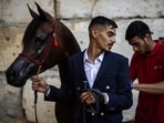 A Palestinian horse-handler waits to show his Arabian horse during a beauty contest at the Rawabi Palestine Arabians show in Rawabi, in the Israeli-occupied West Bank, on June 27, 2026. Arabian horses are particularly popular in the Palestinian territories, where young men breed them for prestige, racing, and beauty contests.