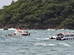 Rescue personnel carry out operations after a speedboat carrying Indian tourists capsized near Hon May Rut Ngoai off Phu Quoc Island, Vietnam, on Saturday. Fifteen Indian tourists were killed and 16 others rescued in the accident.
