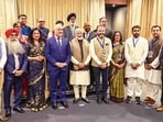 Prime Minister Narendra Modi with New Zealand Prime Minister Christopher Luxon and others during a community event in Auckland, New Zealand. (@NarendraModi)